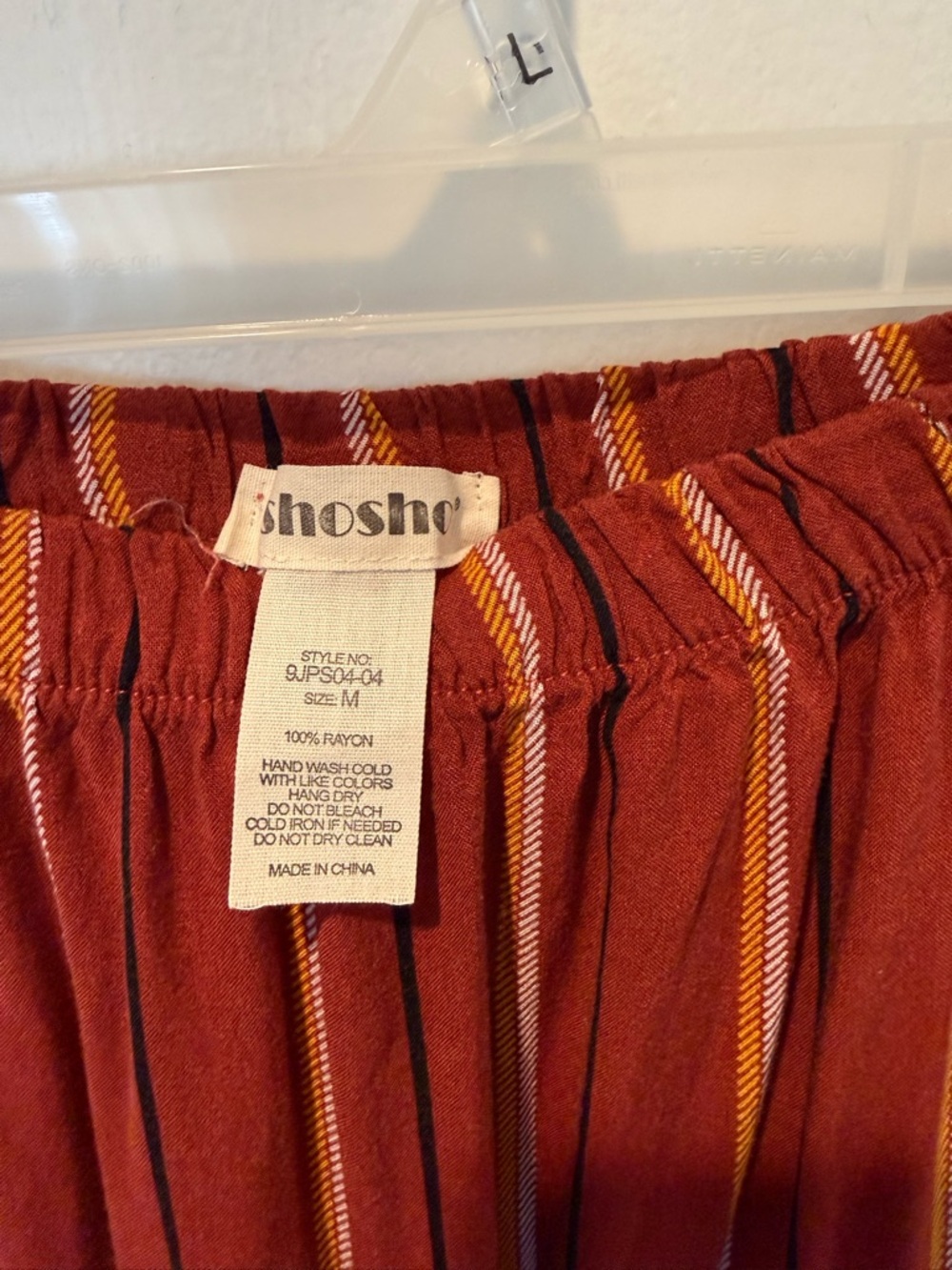 Women’s Rust colored Striped Strapless Wide-Leg Jumpsuit - Picture 10 of 10
